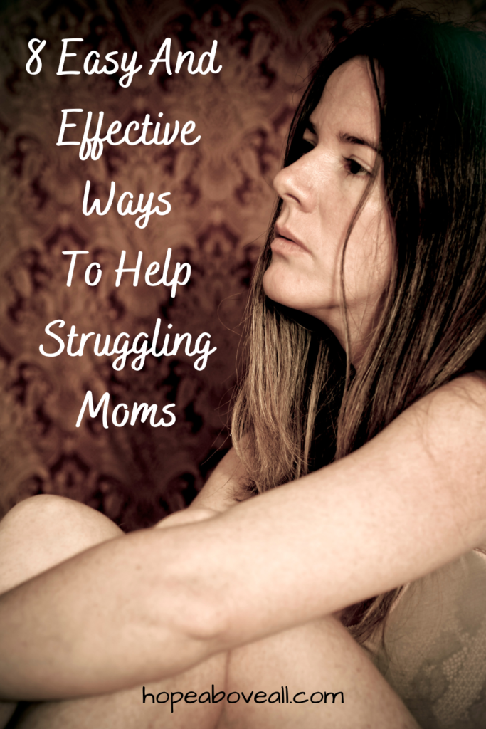 Pin with struggling mom sitting and looking defeated.  Pin title: 8 Easy And Effective Ways To Help Struggling Moms, is at the top left corner.