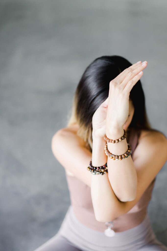 Picture of a woman practicing meditation.
