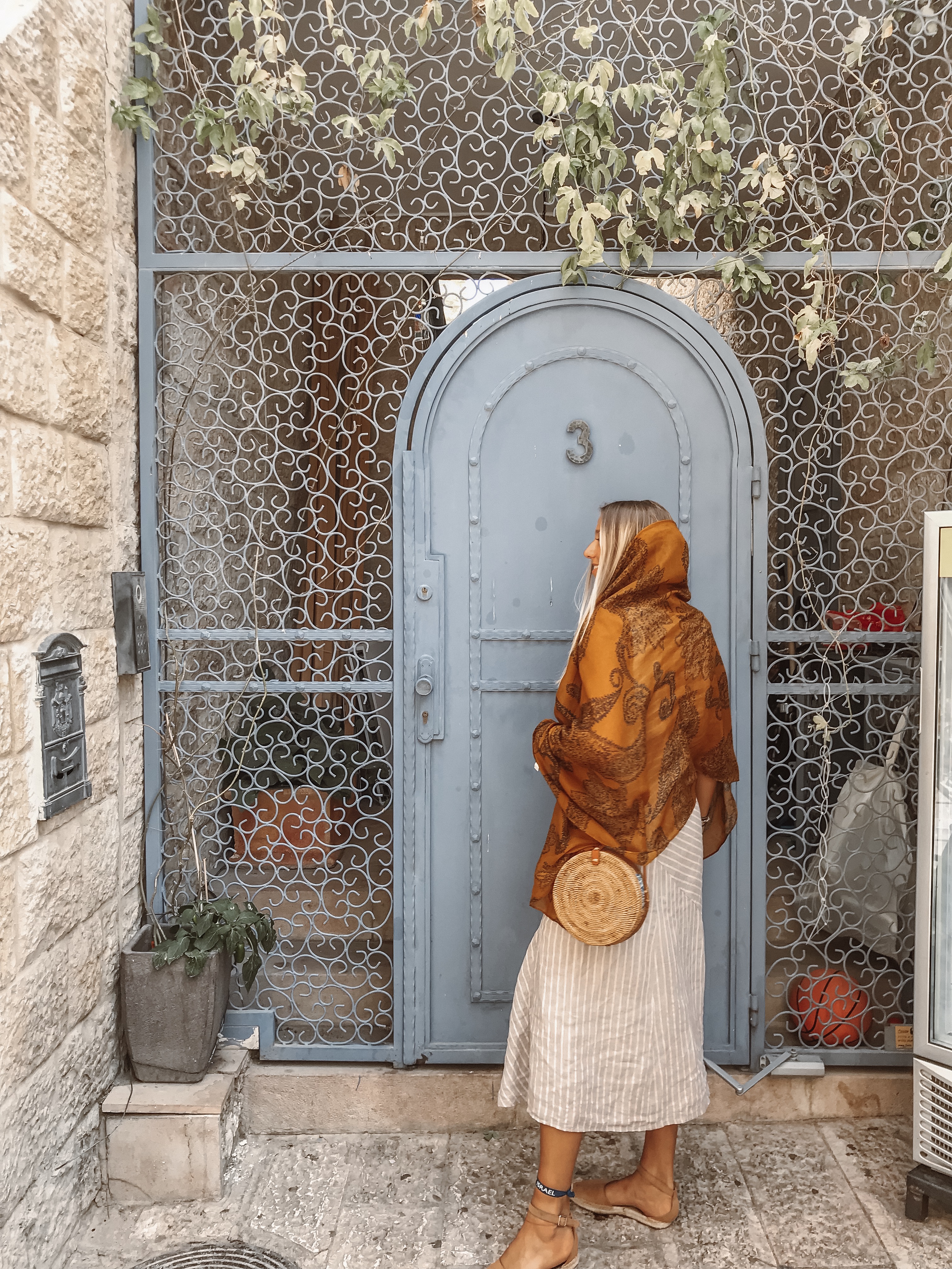 woman standing at front door