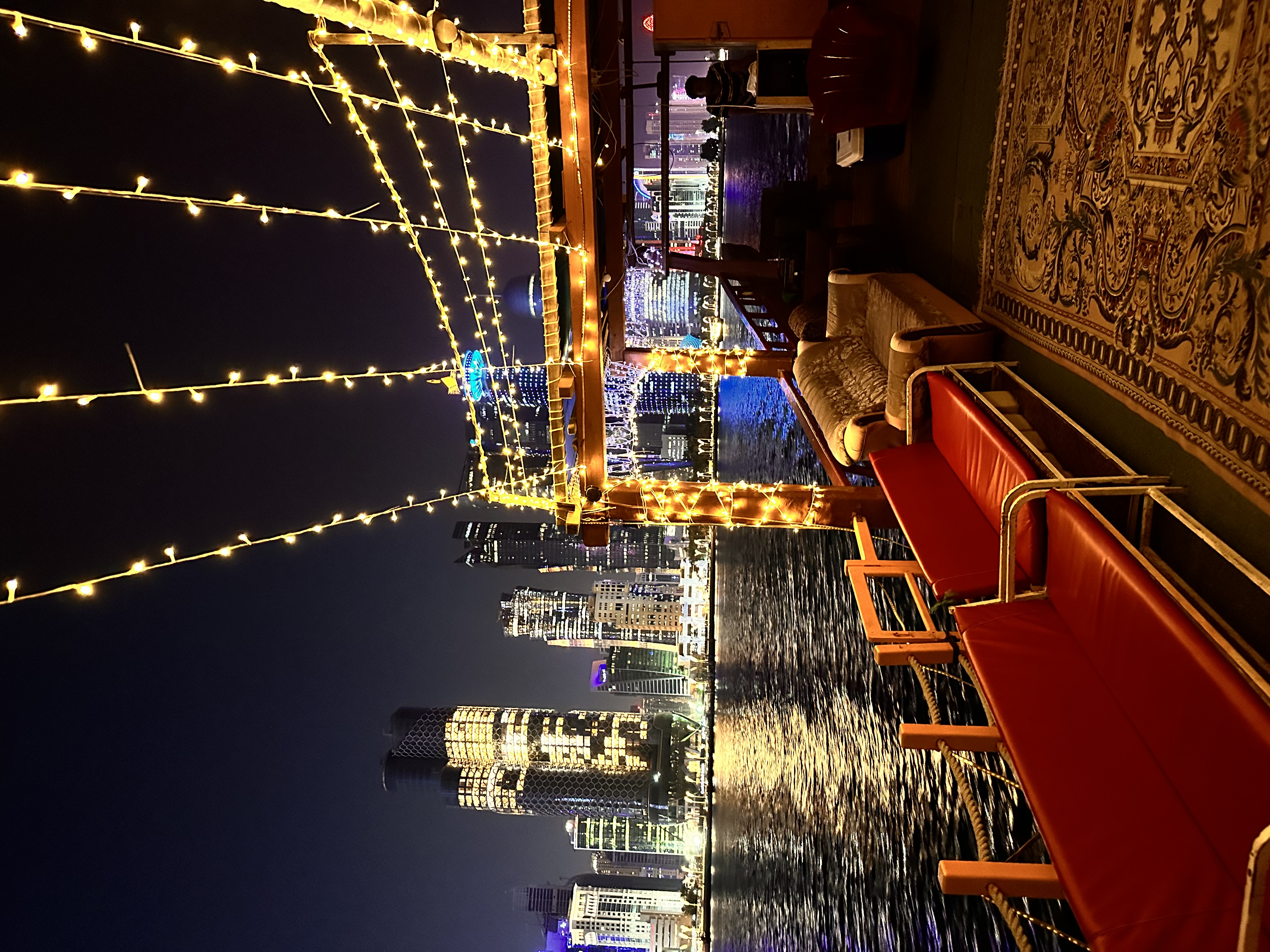 Boat ride in Doha with views of the city skyline